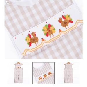 Stitchy Fish romper with smocked turkeys.